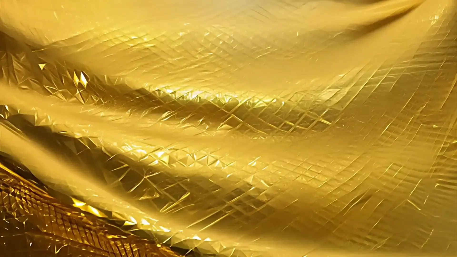 Luxurious Golden Fabric Flow Background for High-End Fashion Videos